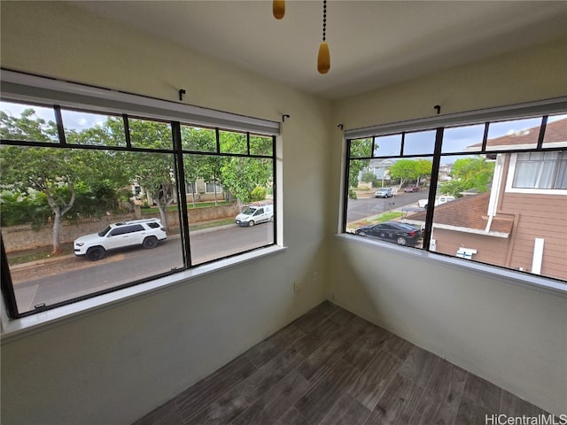 spare room with dark wood-type flooring