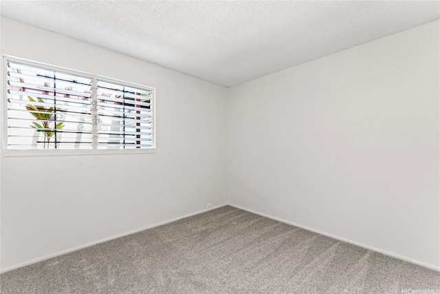 98-519 Lulu Pl Unit 73, Aiea, HI 96701 - carpeted empty room featuring a textured ceiling and baseboards