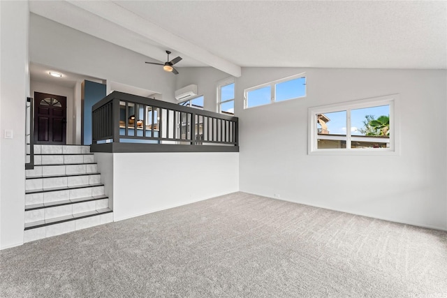 98-519 Lulu Pl Unit 73, Aiea, HI 96701 - unfurnished living room featuring a wall mounted AC, stairway, carpet, and a ceiling fan