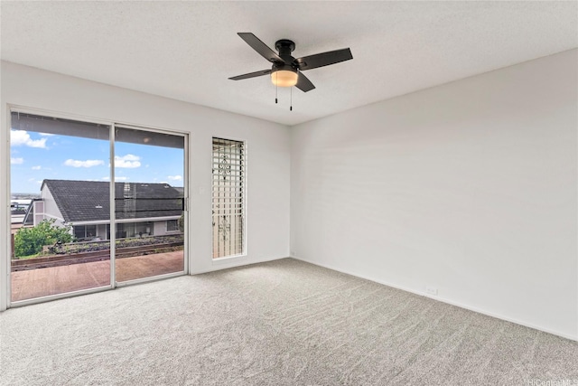 98-519 Lulu Pl Unit 73, Aiea, HI 96701 - carpeted spare room with a ceiling fan and baseboards