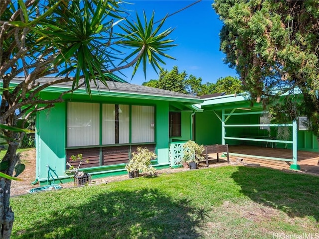 view of front of home with a front yard