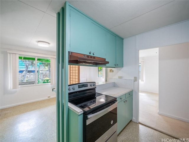 kitchen with stainless steel electric range oven