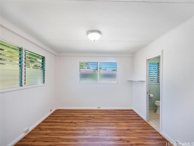 empty room featuring hardwood / wood-style flooring