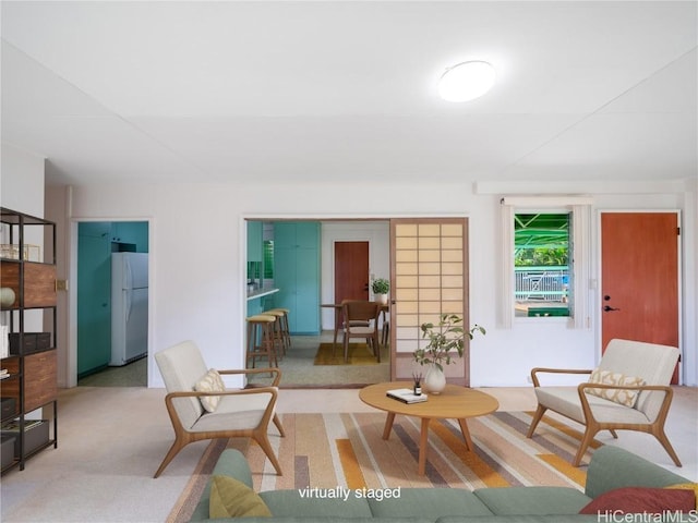 living room with light colored carpet