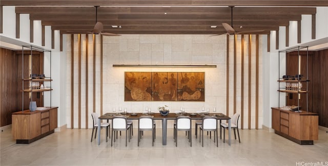 interior space featuring tile walls and light tile patterned flooring