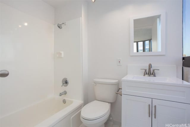 full bathroom with shower / bathing tub combination, vanity, and toilet