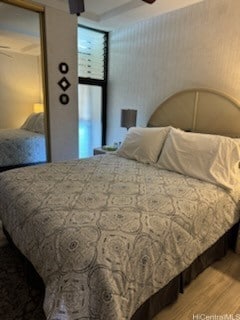 bedroom featuring hardwood / wood-style flooring