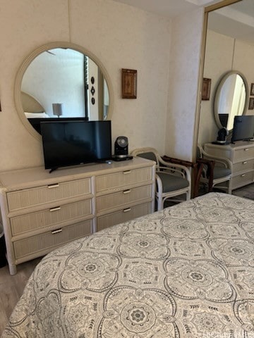 bedroom featuring light hardwood / wood-style flooring