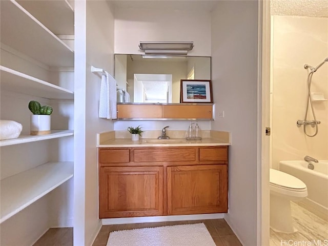 full bathroom with tile patterned flooring, vanity, toilet, and bathing tub / shower combination