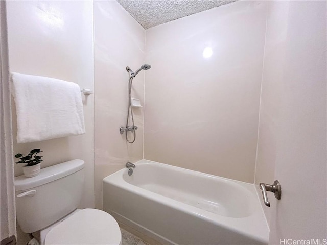 bathroom featuring toilet, shower / tub combination, and a textured ceiling