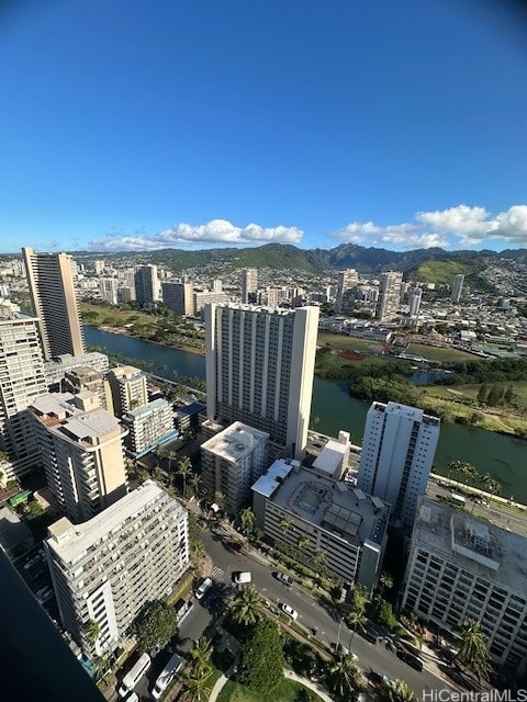 bird's eye view with a water and mountain view