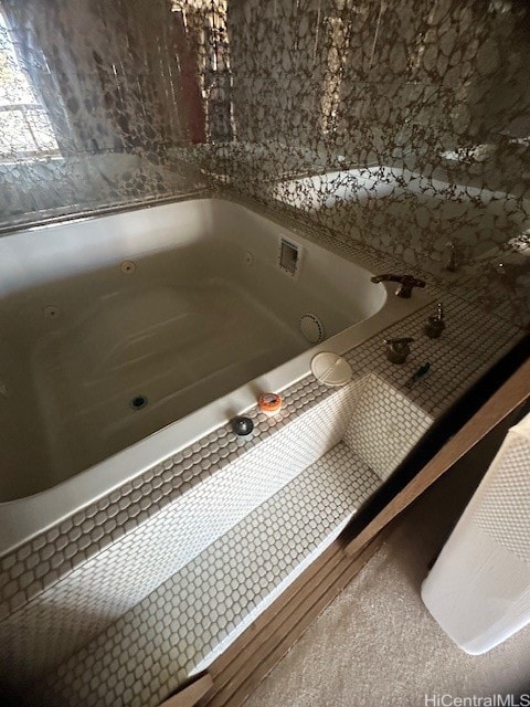 bathroom with a tub