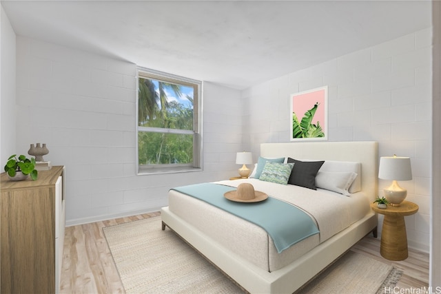 bedroom featuring light hardwood / wood-style flooring