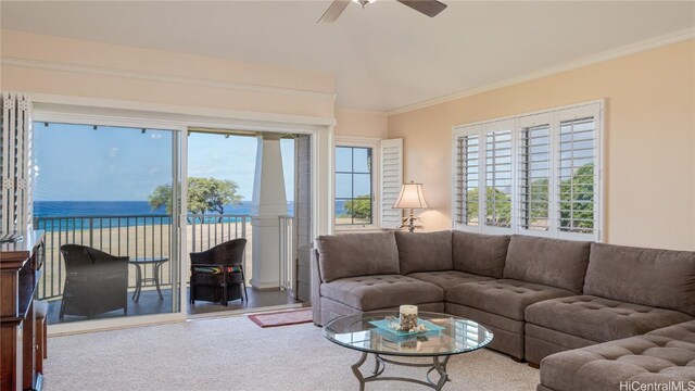 carpeted living room featuring plenty of natural light, ornamental molding, and ceiling fan