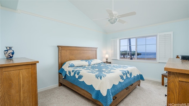 carpeted bedroom featuring vaulted ceiling, ceiling fan, and ornamental molding