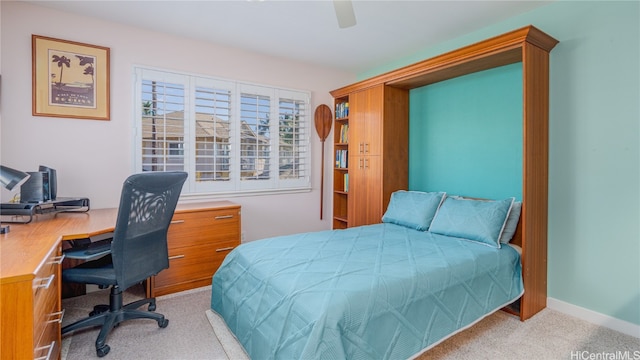 bedroom with light carpet and ceiling fan