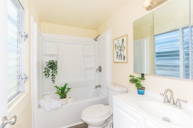 full bathroom featuring vanity, toilet, and tub / shower combination