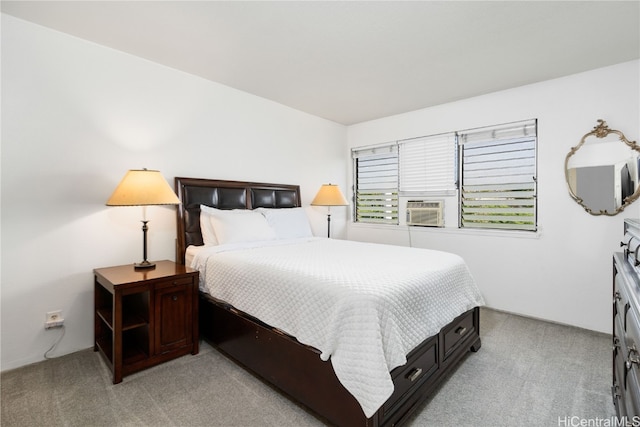 bedroom featuring light colored carpet and cooling unit