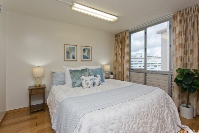 bedroom featuring light hardwood / wood-style flooring