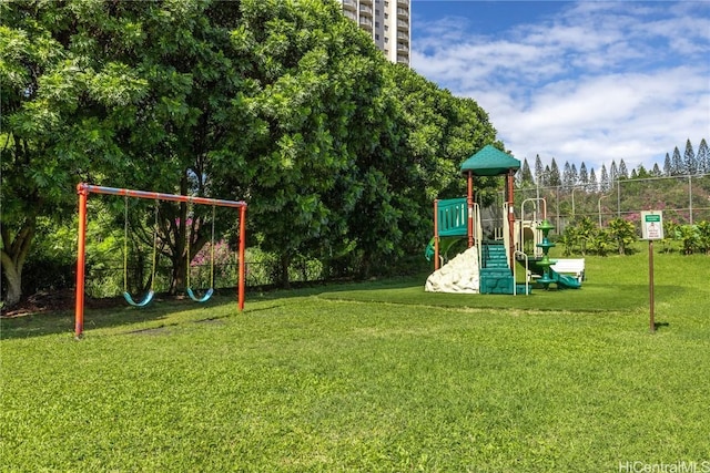 view of jungle gym featuring a yard