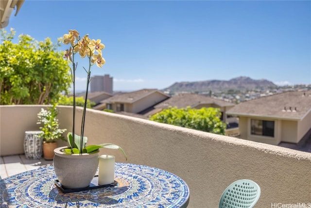 balcony featuring a mountain view