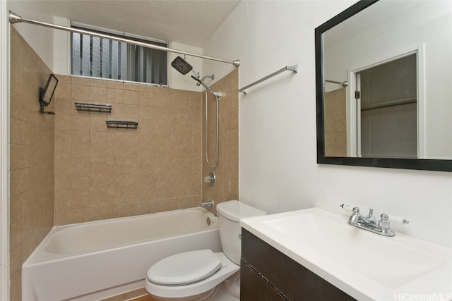 full bathroom featuring vanity, toilet, and tiled shower / bath combo