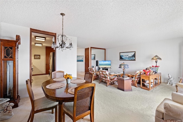 6750 Hawaii Kai Dr Unit 505, Honolulu, HI 96825 - dining room featuring a chandelier, light carpet, and a textured ceiling