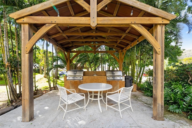 6750 Hawaii Kai Dr Unit 505, Honolulu, HI 96825 - view of patio with exterior kitchen, a gazebo, and outdoor dining area