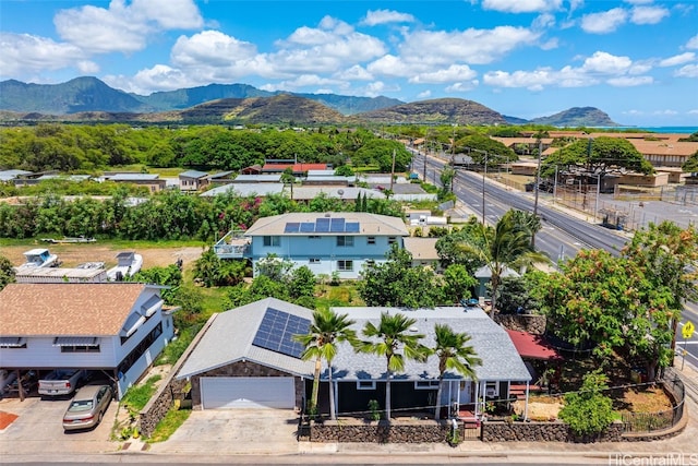 birds eye view of property featuring a mountain view