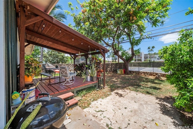 view of yard featuring a wooden deck