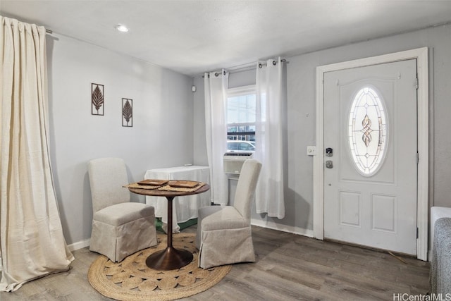 foyer entrance with hardwood / wood-style flooring