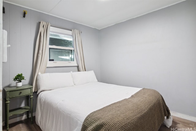 bedroom with wood-type flooring