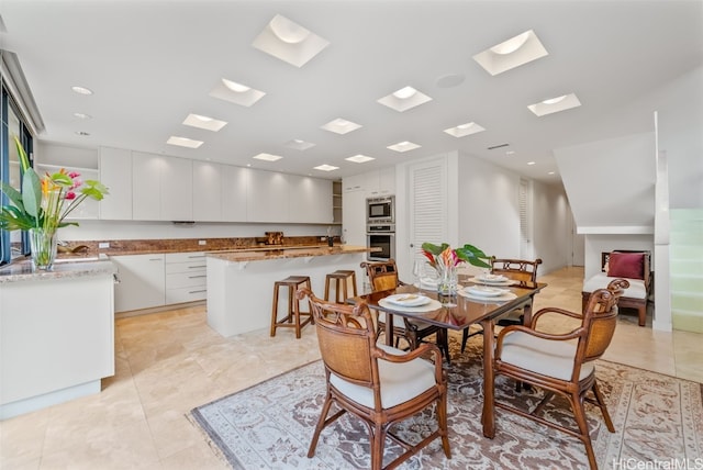 view of tiled dining space