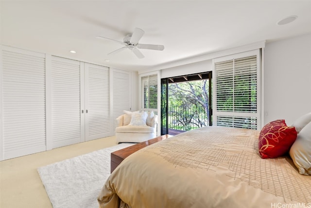 bedroom featuring access to exterior, ceiling fan, and carpet