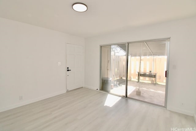 empty room featuring light hardwood / wood-style floors