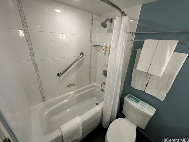 bathroom featuring toilet and shower / tub combo