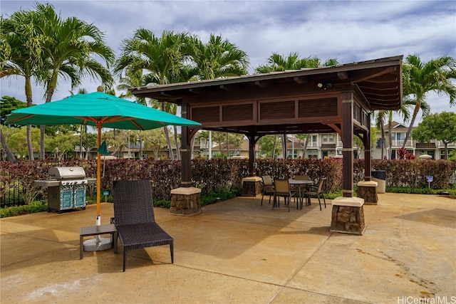 view of patio with a gazebo and a grill