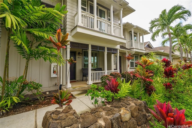 doorway to property featuring a balcony