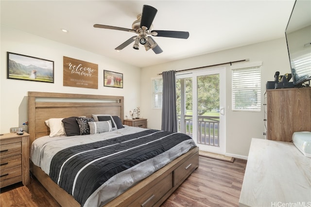 bedroom with access to outside, ceiling fan, and hardwood / wood-style floors