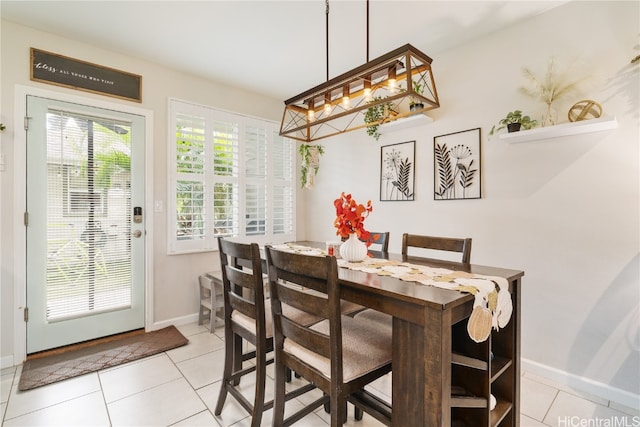 dining space with light tile patterned flooring