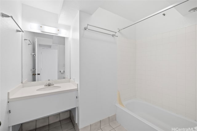 bathroom featuring shower / washtub combination, tile patterned flooring, and vanity