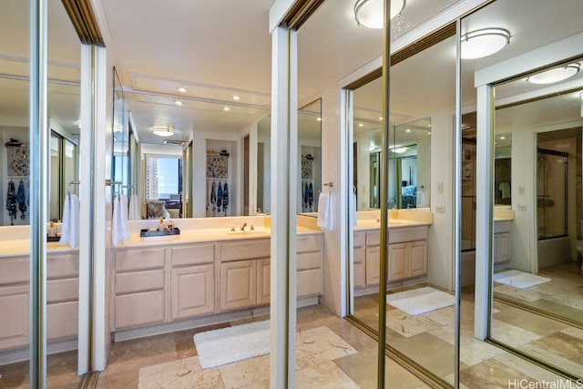 bathroom featuring vanity and ornamental molding