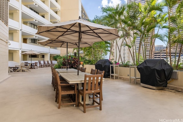 view of patio featuring a grill