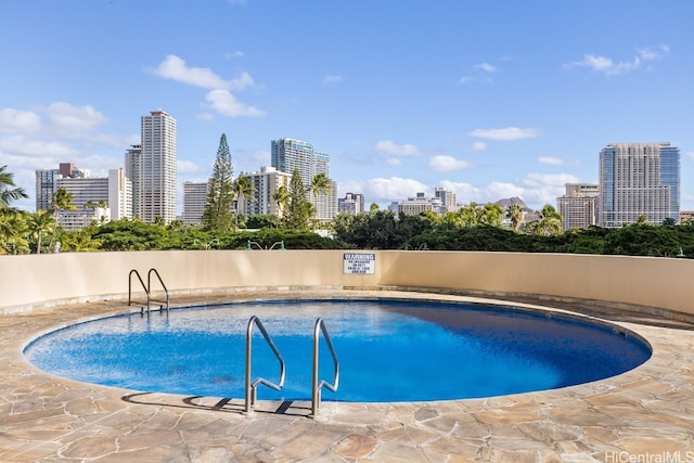 view of pool with a patio area