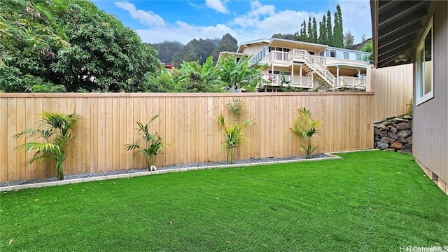 view of yard featuring a fenced backyard