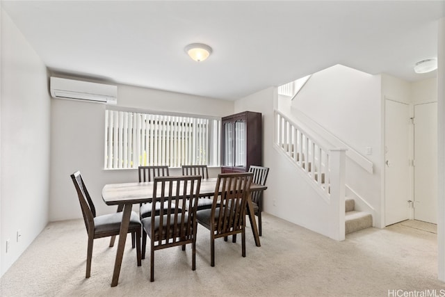 dining area with light colored carpet and a wall mounted air conditioner