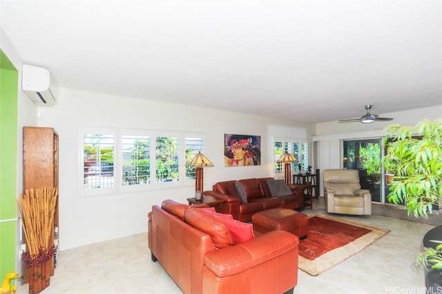 living room with plenty of natural light, a wall mounted AC, and ceiling fan