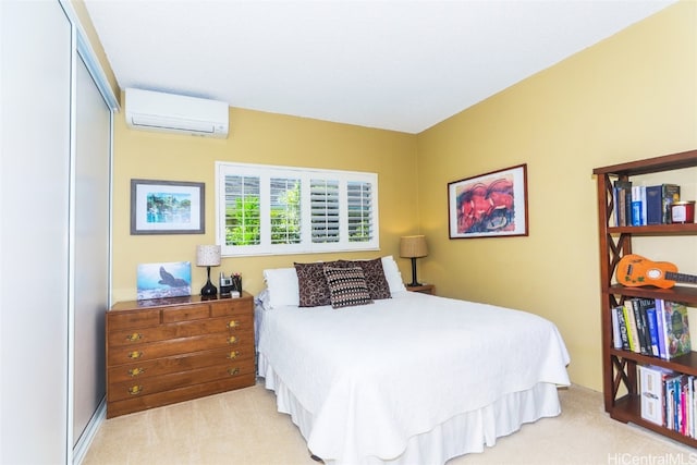 bedroom featuring a closet, light colored carpet, and a wall mounted air conditioner