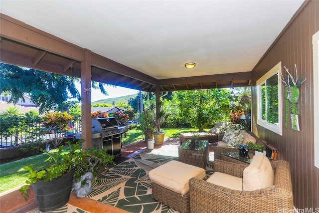 view of patio featuring a grill