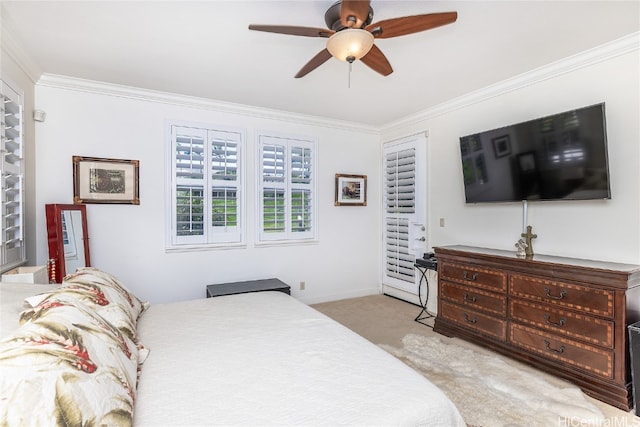 bedroom featuring ceiling fan, crown molding, and light carpet